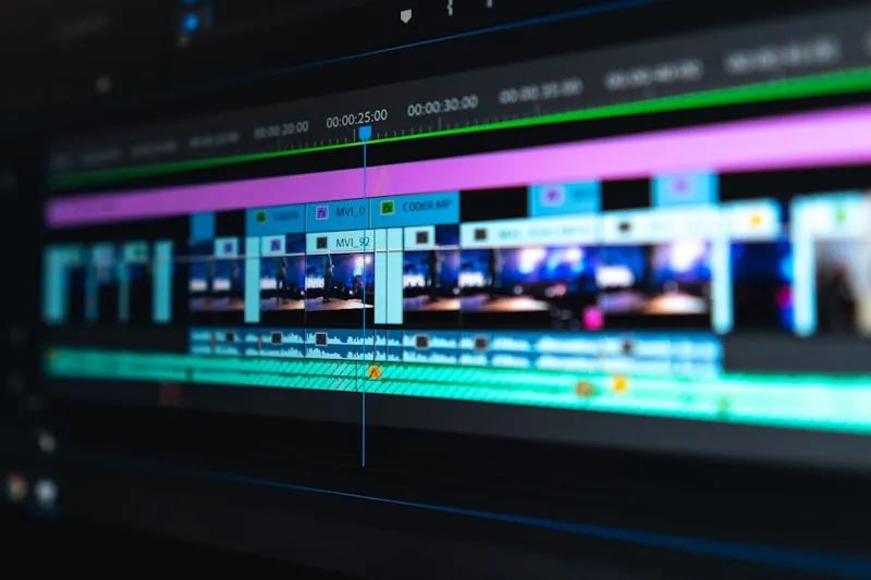 Color grading suite with multiple monitors showing film footage