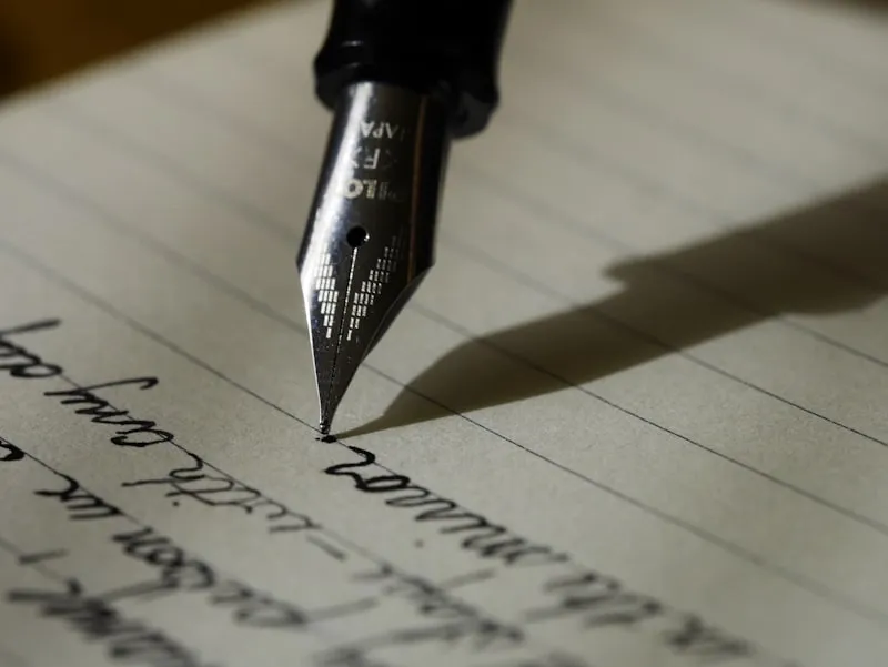 Writer working on a screenplay at a vintage typewriter